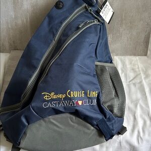 NWT. Disney Cruise Line Castaway Club 
Navy & Gray Blueish Sling Backpack